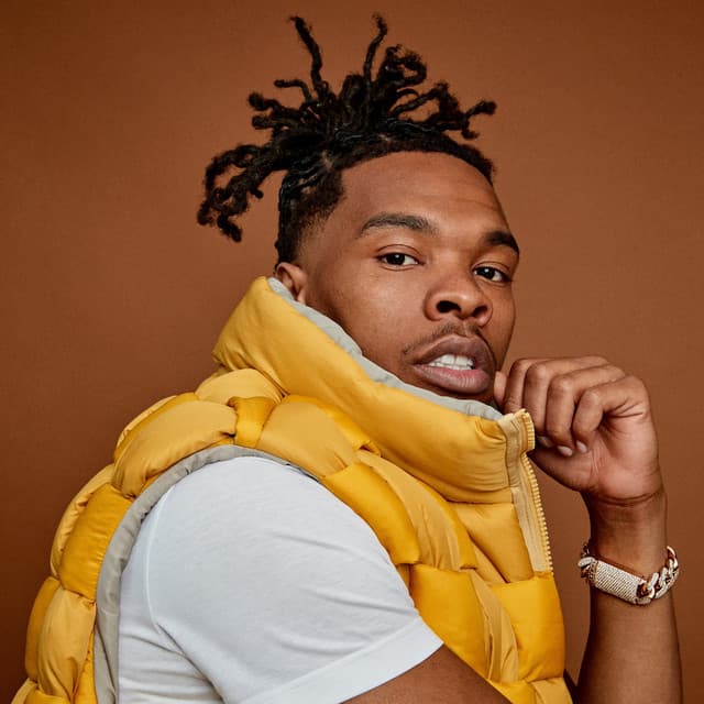 The rapper lil baby wearing a puffer vest jacket
